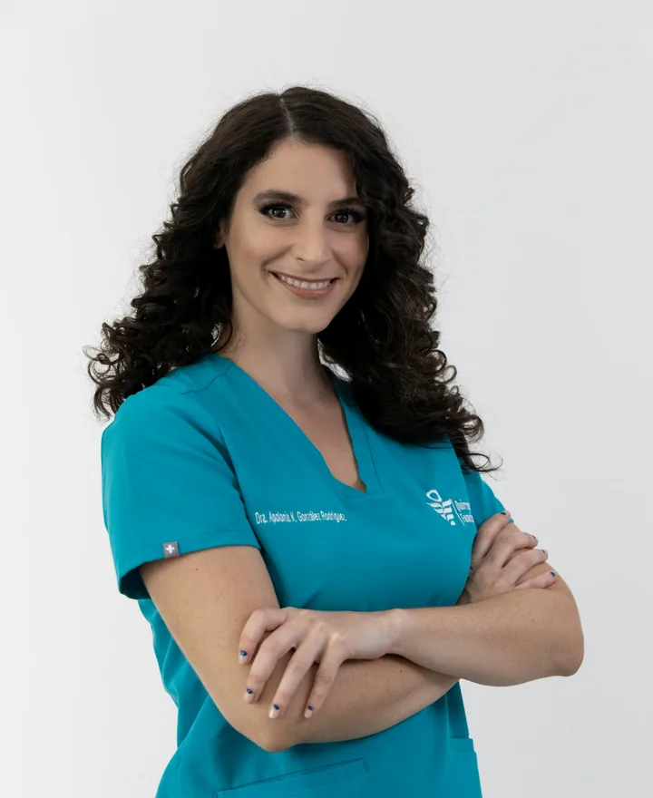 Portrait of Renee, dental hygienist, in teal scrubs